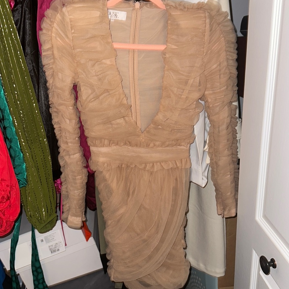 Sexy Hpuse of London dress in beige. Never worn